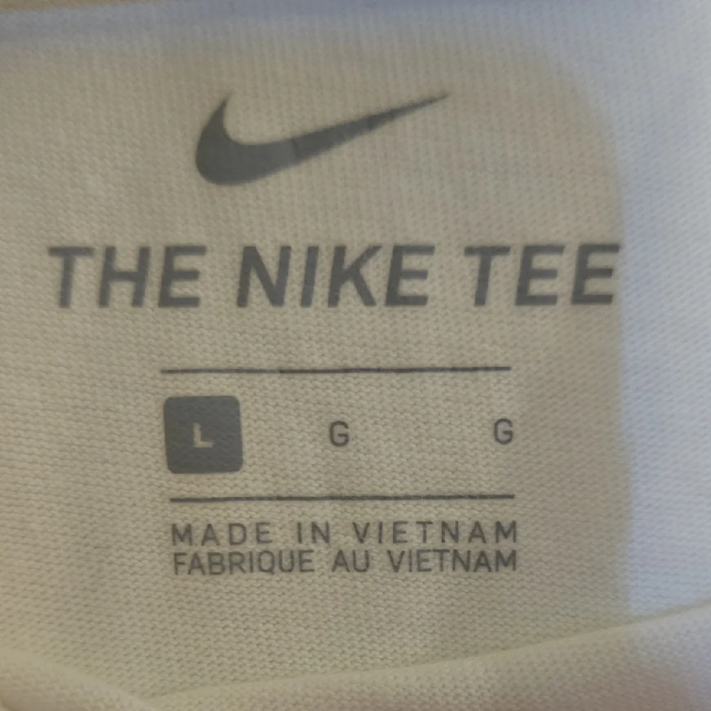 Nike World Tour White T-Shirt with Blue and Orange‎ Graphics